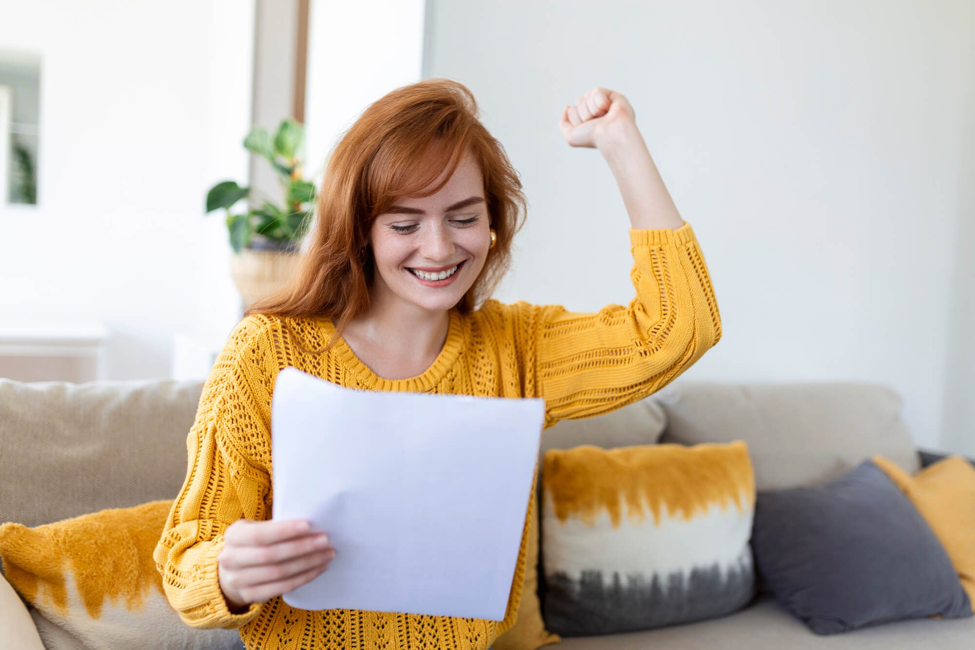 woman smiling after getting Free Debt Counseling